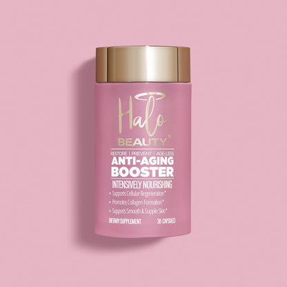 A pink bottle of Halo Beauty Anti-Aging Booster with a gold cap, labeled as a dietary supplement for skin nourishment.