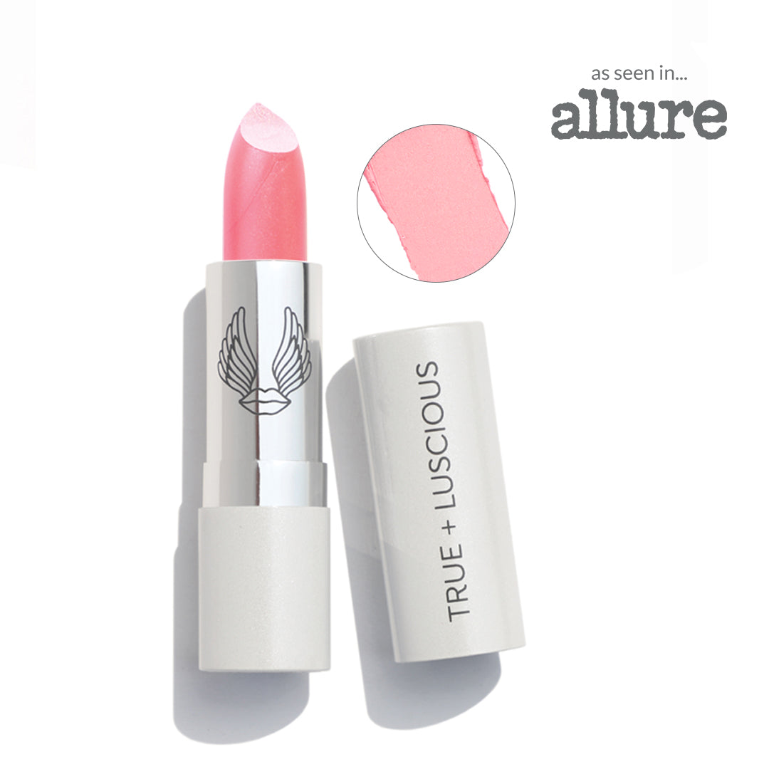 Pink lipstick with white casing on a white background, featuring the 'True + Luscious' brand.