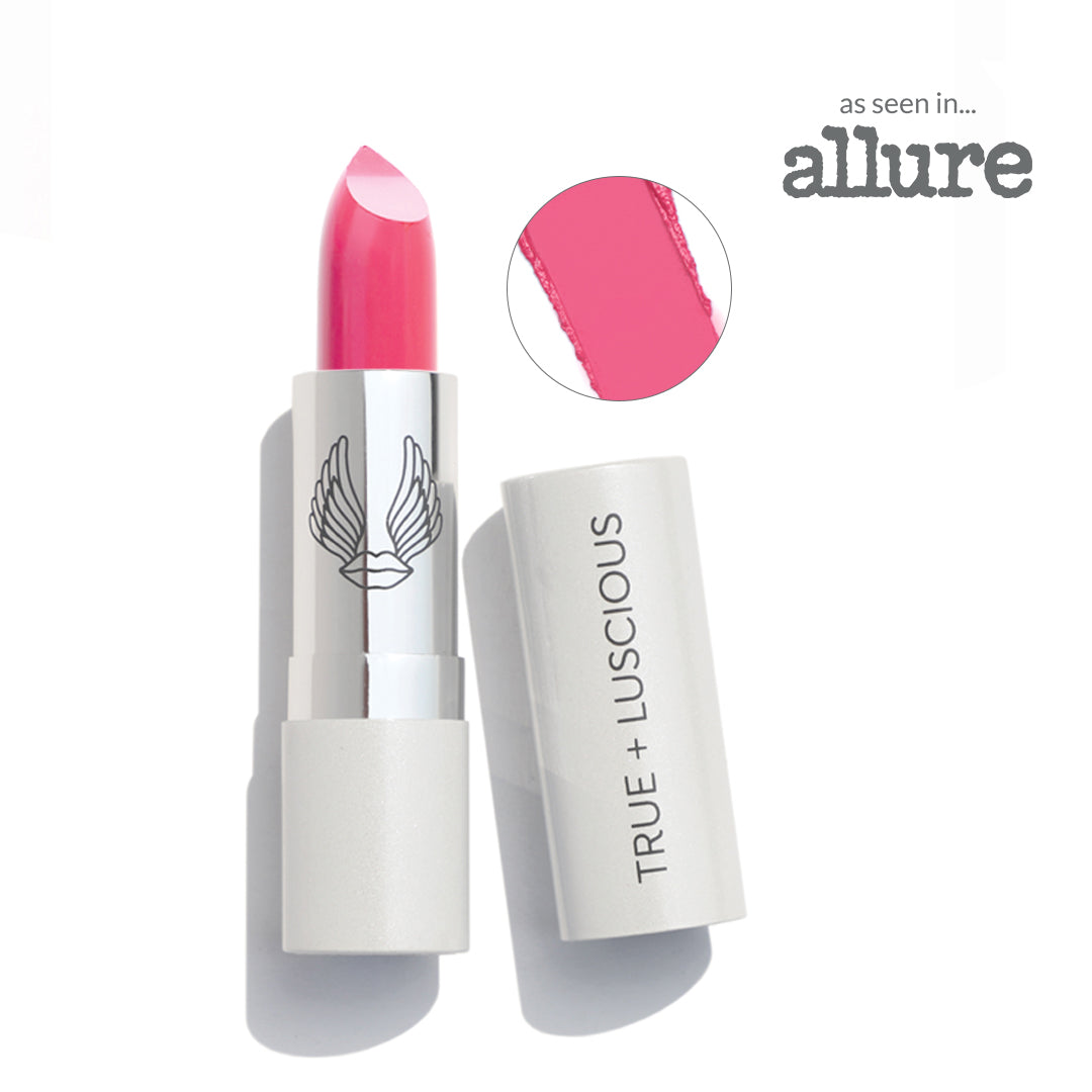 Pink lipstick with white casing on a white background, featuring the 'True + Luscious' brand.