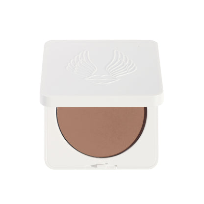 Compact brown powder in a white case on a white background