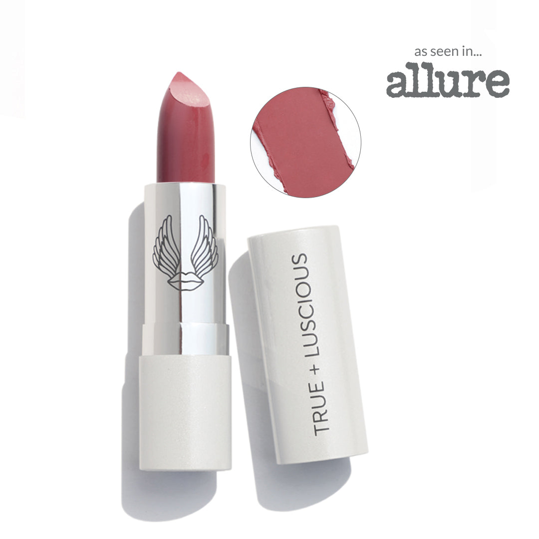Lipstick with white casing and 'True + Luscious' branding, featuring a swatch on a white background.