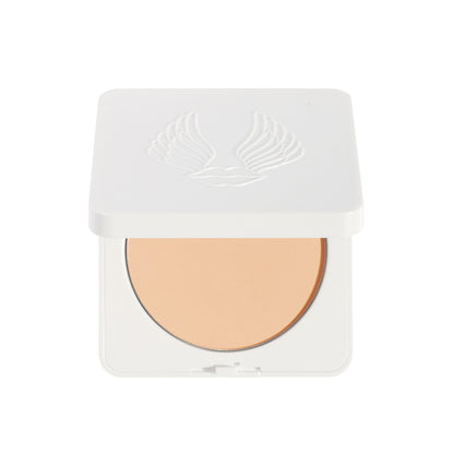 Compact powder in a white case on a white background