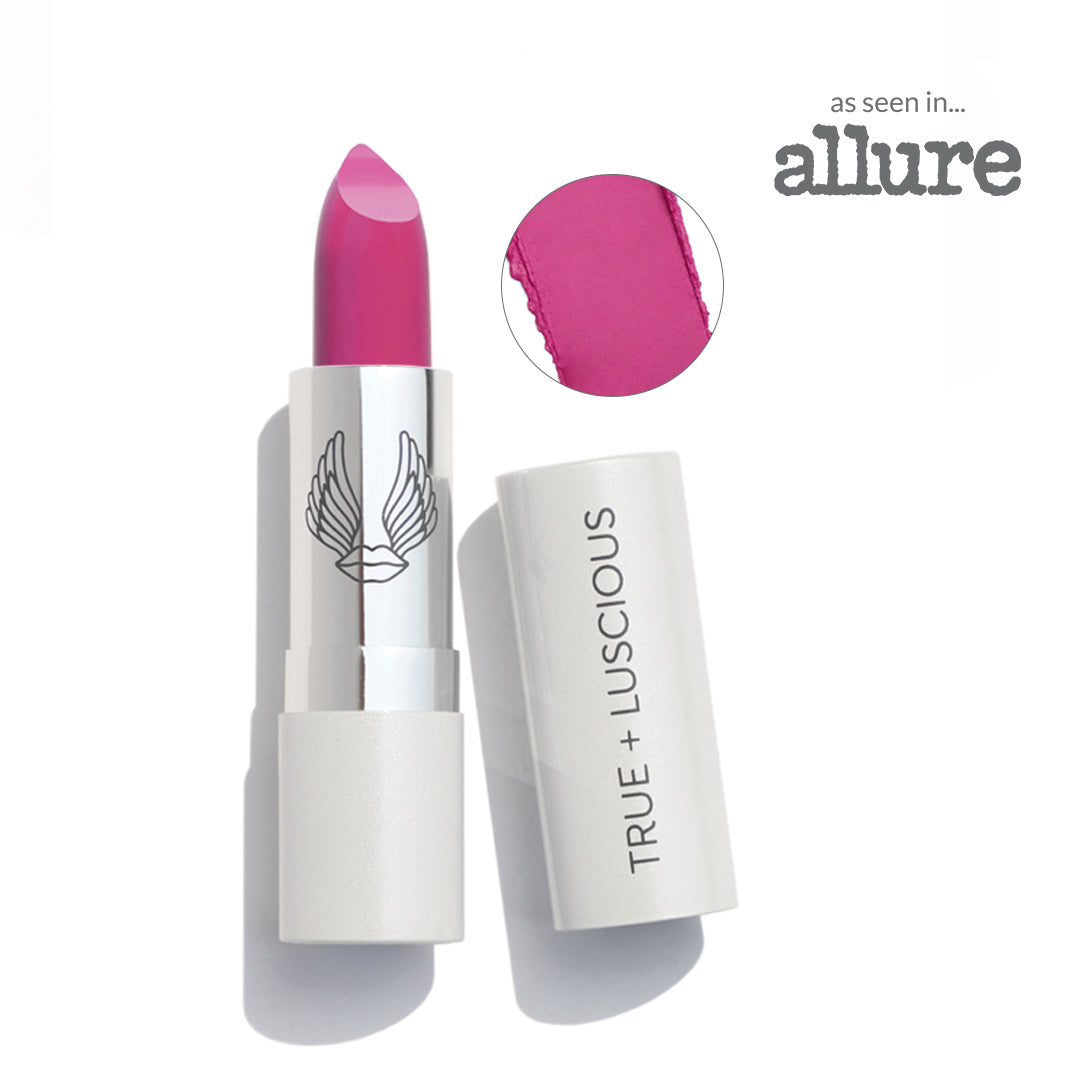 Pink lipstick with white casing on a white background, featuring the 'True + Luscious' brand.
