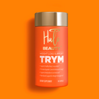 Orange supplement bottle labeled 'Halo Beauty TRYM' on an orange background